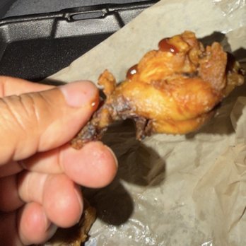 Ray Ray's Chicken Shack - One of the plain chicken wings. I added some sauce to try and help the little guy. - Chicken Shop Near Me - Laurinburg, North Carolina Ray Ray's Chicken Shack - One of the plain chicken wings. I added some sauce to try and help the little guy. - Chicken Shop Near Me - Laurinburg, North Carolina