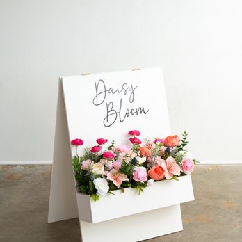 Daisy Bloom Events - flower box to welcome your guest, custom flowers & vinyl! - Balloon Services Near Me Daisy Bloom Events - flower box to welcome your guest, custom flowers & vinyl! - Balloon Services Near Me