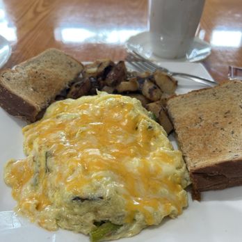 Regan's Orange City Kitchen - Asparagus and portobello mushroom omelet, home fries and rye toast - Breakfast & Brunch Near Me - Orange City, Florida Regan's Orange City Kitchen - Asparagus and portobello mushroom omelet, home fries and rye toast - Breakfast & Brunch Near Me - Orange City, Florida