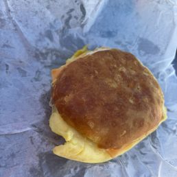 Bacon egg and cheese biscuit. This thing was quite large- and delicious! Bacon egg and cheese biscuit. This thing was quite large- and delicious!