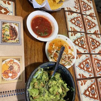 Azteca Mexican Restaurant - a table with chips and guacamole - Mexican Near Me - Charlotte, North Carolina