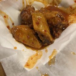 Chicken wings . I think she said sweet chili.