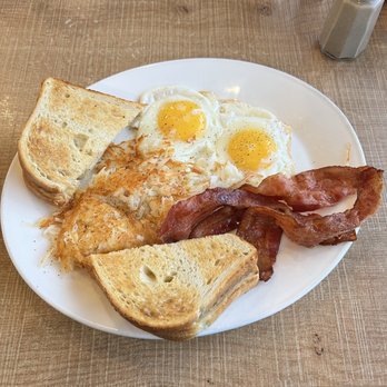 Ricky's All Day Grill - Two eggs with added bacon, hashbrowns and sourdough - Breakfast & Brunch Near Me - Langley, British Columbia Ricky's All Day Grill - Two eggs with added bacon, hashbrowns and sourdough - Breakfast & Brunch Near Me - Langley, British Columbia