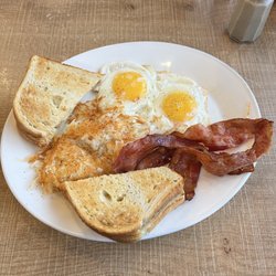 Ricky's All Day Grill - Two eggs with added bacon, hashbrowns and sourdough