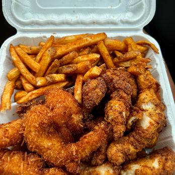 Puritan Backroom - half coconut half spicy tenders with well done spicy fries - Ice Cream & Frozen Yogurt Near Me - Manchester, New Hampshire Puritan Backroom - half coconut half spicy tenders with well done spicy fries - Ice Cream & Frozen Yogurt Near Me - Manchester, New Hampshire