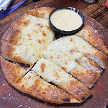 15th Street Pizza & Pub - Cheesy bread...added a side of cheese dip - Pizza Near Me - McDonough, Georgia 15th Street Pizza & Pub - Cheesy bread...added a side of cheese dip - Pizza Near Me - McDonough, Georgia