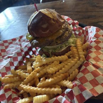 Crystal Palace Saloon - The Crystal Palace burger; with cheddar cheese and extra patty - Bars Near Me - Tombstone, Arizona