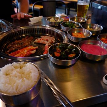 Do Si Korean BBQ - Full spread of food brought to table including meat - Korean Near Me - Seattle, Washington
