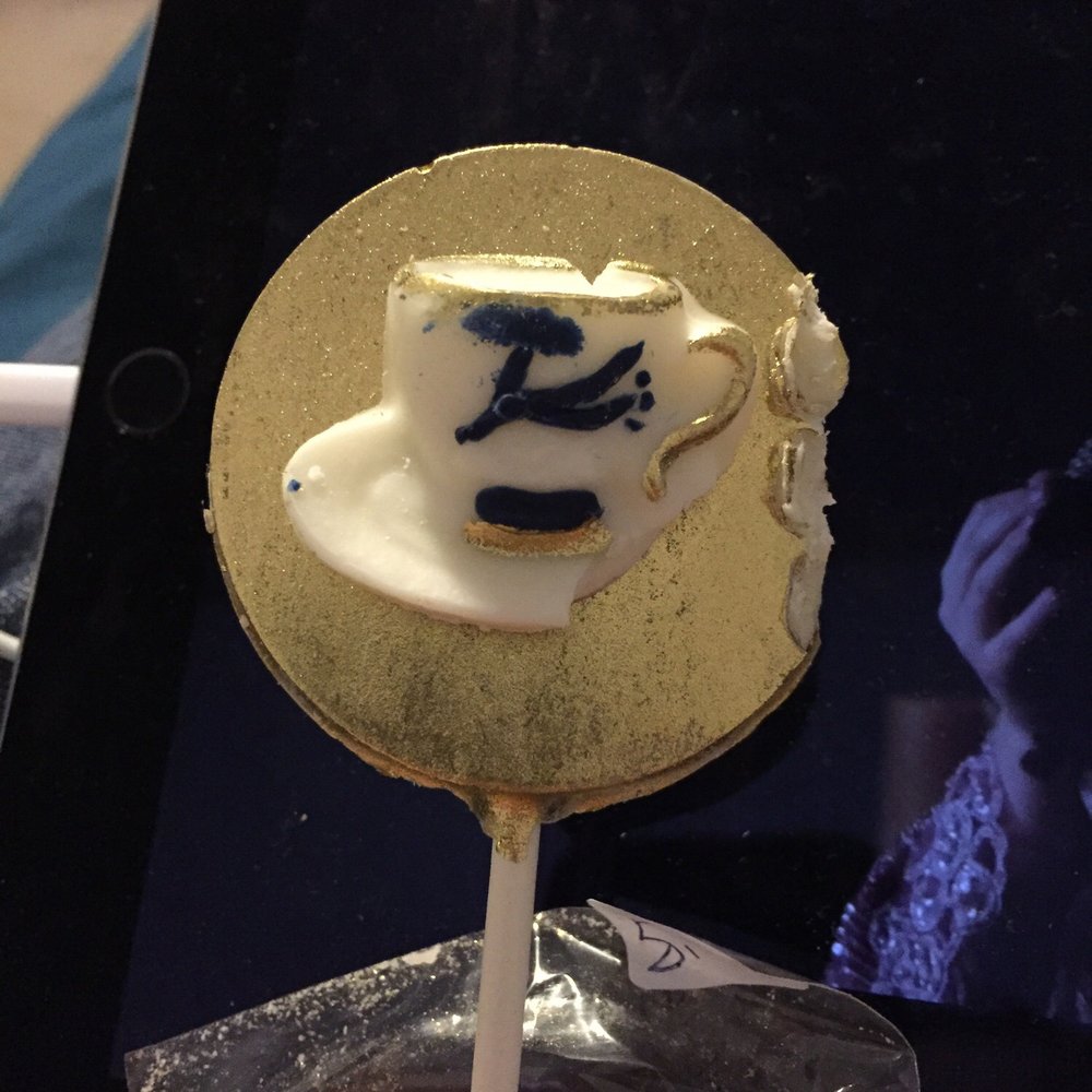 Candy Dish - a person holding a cupcake on a stick - Candy Stores Near Me - Richmond, British Columbia Candy Dish - a person holding a cupcake on a stick - Candy Stores Near Me - Richmond, British Columbia