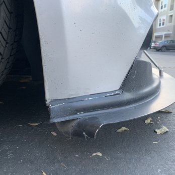 Big O Tires - Front Passenger Side: You can see a complete separation of the lip and the bumper as well as the major damage to the lower splitter. - Tires Near Me - Dublin, California Big O Tires - Front Passenger Side: You can see a complete separation of the lip and the bumper as well as the major damage to the lower splitter. - Tires Near Me - Dublin, California