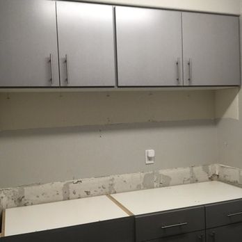 Stepko Tile - Before a cut out for the sink was made - General Contractors Near Me
