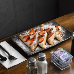 Foodie Club - Fresh strawberries, warm French toast, and a hot cup of coffee. Welcome to your new favorite spot.