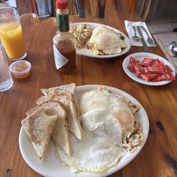 Moke’s Bread And Breakfast - Stuffed hash brown with egg on top! - Breakfast & Brunch Near Me - Honolulu, Hawaii Moke’s Bread And Breakfast - Stuffed hash brown with egg on top! - Breakfast & Brunch Near Me - Honolulu, Hawaii