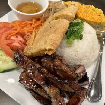 Pho Mai - Combination rice platter with marinaded grill pork, egg loaf, shrimp tofu skin roll, veggies, rice, and fish sauce. - Vietnamese Near Me - Eden Prairie, Minnesota Pho Mai - Combination rice platter with marinaded grill pork, egg loaf, shrimp tofu skin roll, veggies, rice, and fish sauce. - Vietnamese Near Me - Eden Prairie, Minnesota