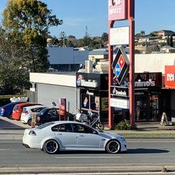 Red Rooster - The faded sign. A commodore.