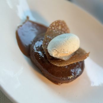 Amal - Dessert : Date Cake with vanilla ice cream. - Lebanese Near Me - Miami, Florida Amal - Dessert : Date Cake with vanilla ice cream. - Lebanese Near Me - Miami, Florida