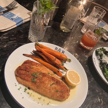 Buck & Rider - Pan Seared Red Snapped served along side whole baby carrots. a fresh lemon half and finished with a light drizzle of herb-infused buttery ci - Seafood Near Me - Phoenix, Arizona