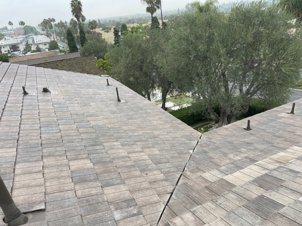 Slide of Green Shield Roofing