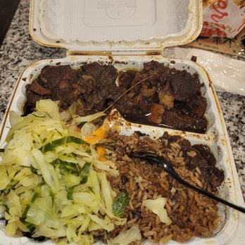 Jamaican Summers Eatery - oxtails decent  very tiny in a small takeout container. cabbage bland - Caribbean Near Me - Burleson, Texas