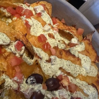 Boston's On the Beach - Nachos!!!  Yum.  Perfect for our group of people to share. The right amount is everything on top. - Seafood Near Me - Delray Beach, Florida