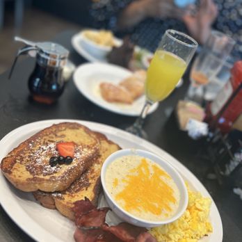 Grits and Eggs Breakfast Kitchen - French Toast and eggs with a side of grits and turkey bacon - Breakfast & Brunch Near Me - Atlanta, Georgia