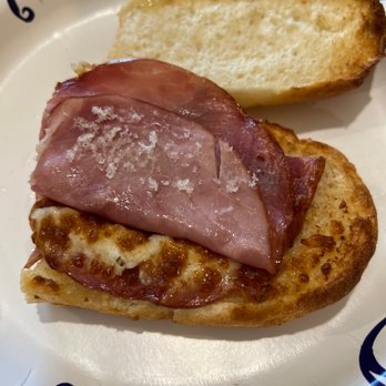 Pizza King - a piece of bread with meat on it - Pizza Near Me - Greensburg, Indiana