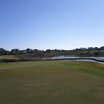 BlackHorse Golf Club - River course # 17 volcano Green par 3. Looking back towards the T box. - Golf Near Me - Cypress, Texas