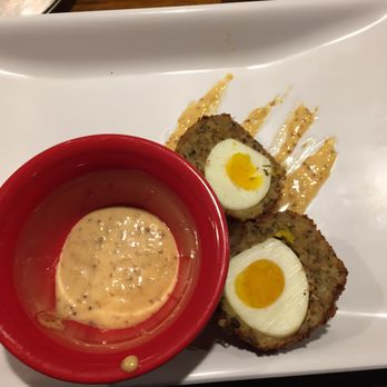 The Library - Scotch Eggs, delivered cold. Not a good look for eggs, or sausage. - Gastropubs Near Me - New Orleans, Louisiana The Library - Scotch Eggs, delivered cold. Not a good look for eggs, or sausage. - Gastropubs Near Me - New Orleans, Louisiana