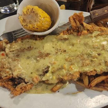 The Rackhouse - Texas fried steak with jalapeño cream gravy, fries and corn - American Near Me - The Colony, Texas The Rackhouse - Texas fried steak with jalapeño cream gravy, fries and corn - American Near Me - The Colony, Texas