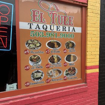 El Tule Taqueria - a sign for a restaurant - Mexican Near Me - Woodburn, Oregon El Tule Taqueria - a sign for a restaurant - Mexican Near Me - Woodburn, Oregon