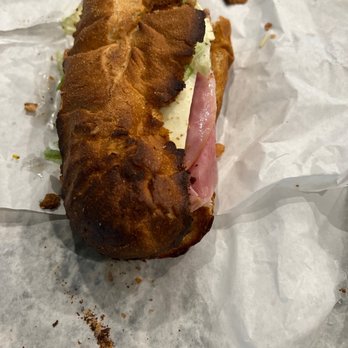 American Pizza - a half eaten sandwich on a piece of wax paper - Pizza Near Me - Highland, California American Pizza - a half eaten sandwich on a piece of wax paper - Pizza Near Me - Highland, California