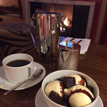 The Ivy Hotel - Room service in our suite in front of the fire. I thought the brownie sundae looked too large. Not so. Savored every bite. - Hotels Near Me - Baltimore, Maryland