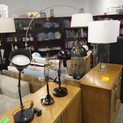 Modern arc floor lamps to sleek desk and statement table lamps, find brand new and premium fixtures, some new display models, some in box.