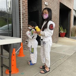 Kids waiting for instructor to do temp checks and covid safety procedures. Kids waiting for instructor to do temp checks and covid safety procedures.
