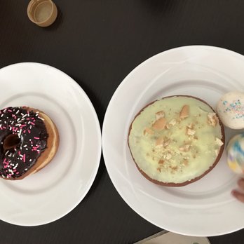 FROST - Chocolate Chocolate Sprinkle Ring Doughnut Banana cream Mexican Mexican Vanilla Rainbow Macaron Birthday macaron - Bakeries Near Me - Mill Creek, Washington FROST - Chocolate Chocolate Sprinkle Ring Doughnut Banana cream Mexican Mexican Vanilla Rainbow Macaron Birthday macaron - Bakeries Near Me - Mill Creek, Washington
