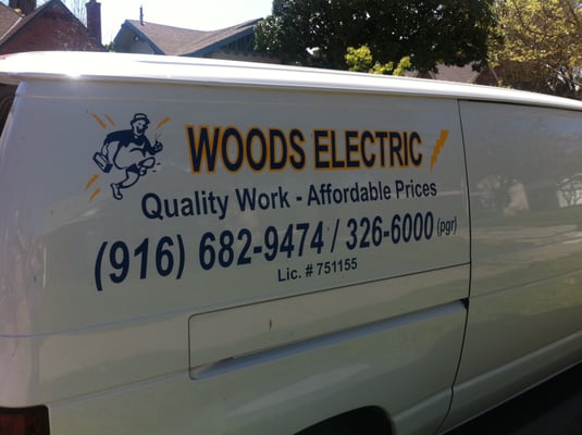 Woods Electric Logo