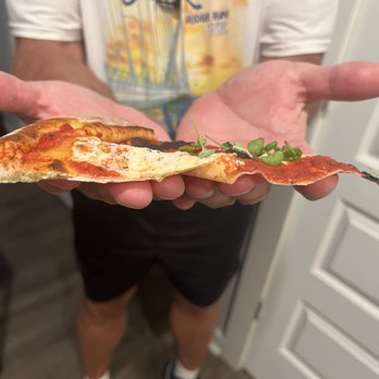 New Realm Brewing - Thinnest pizza I've ever seen in my life. Might be record setting actually. - Brewpubs Near Me - Charleston, South Carolina New Realm Brewing - Thinnest pizza I've ever seen in my life. Might be record setting actually. - Brewpubs Near Me - Charleston, South Carolina