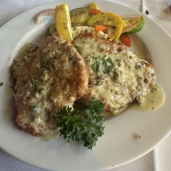 Legend's Restaurant - Pork schnitzel in a lemon caper sauce, sour cream and onion mashed potatoes, vegetable medley - Seafood Near Me - Norman, Oklahoma Legend's Restaurant - Pork schnitzel in a lemon caper sauce, sour cream and onion mashed potatoes, vegetable medley - Seafood Near Me - Norman, Oklahoma