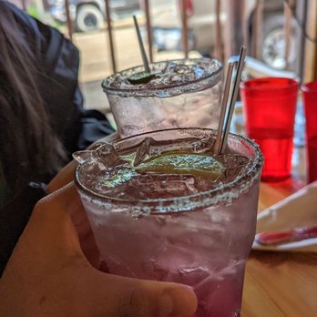Serranos Mexican Restaurant - These are "Adventurous Margaritas". They're margaritas but with huckleberry and jalapeno syrups. Cloying. Need more jalapeno. - Mexican Near Me - East Glacier Park, Montana