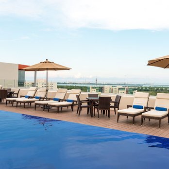 Four Points by Sheraton Cancun Centro - Rooftop Swimming Pool - Hotels Near Me - Cancun, ROO Four Points by Sheraton Cancun Centro - Rooftop Swimming Pool - Hotels Near Me - Cancun, ROO
