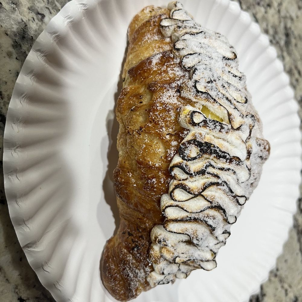 Godfrey’s Bakery and Cafe - Lemon Meringue Croissant - Bakeries Near Me - Falls Church, Virginia Godfrey’s Bakery and Cafe - Lemon Meringue Croissant - Bakeries Near Me - Falls Church, Virginia