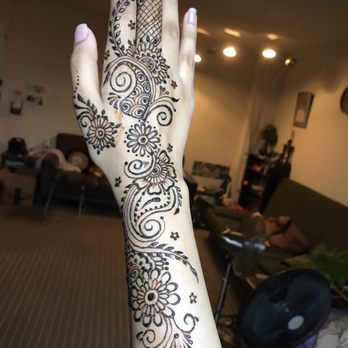 Henna by Kenzi - Floral and vines henna design - Henna Artists Near Me