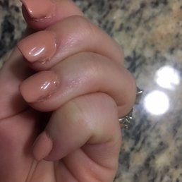 My nails 10 minutes after leaving Julies.  Worst full set gel manicure I've ever had :(