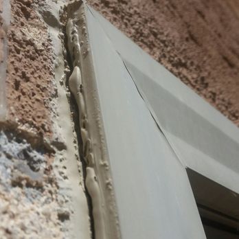 California Windows and Doors - You can see the window separating from the wall. It gets worse with heat. The stucco is chipped badly so they could "make it flush". - Windows Installation Near Me California Windows and Doors - You can see the window separating from the wall. It gets worse with heat. The stucco is chipped badly so they could "make it flush". - Windows Installation Near Me