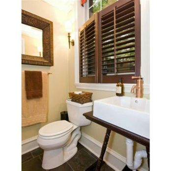 Exedra Collective - a bathroom with a toilet and sink - General Contractors Near Me Exedra Collective - a bathroom with a toilet and sink - General Contractors Near Me