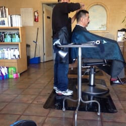 Lotus Hair Salon - Jimmy cutting hair