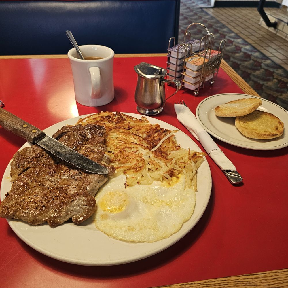 Millie's Restaurant & Bakery - This is a picture of my delicious steak and eggs with hash Brown English muffin on the side and coffee with oat milk. - Bakeries Near Me - Van Nuys, California Millie's Restaurant & Bakery - This is a picture of my delicious steak and eggs with hash Brown English muffin on the side and coffee with oat milk. - Bakeries Near Me - Van Nuys, California