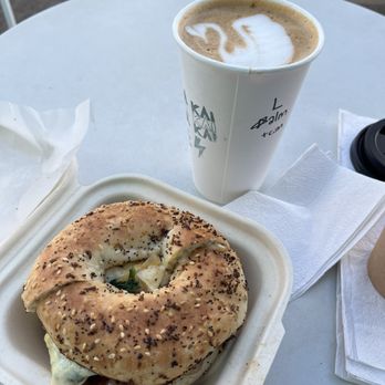 Java Kai Kauai - Surfer Girl Bagel breakfast sandwich and an Almond milk latte. - Breakfast & Brunch Near Me - Kapaa, Hawaii