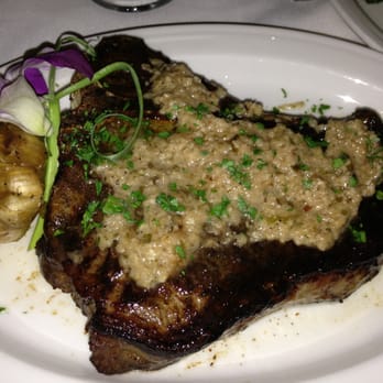 J Ford's Black Angus - T-bone steak with dried mushroom. Stupendous. - New American Near Me - Terre Haute, Indiana