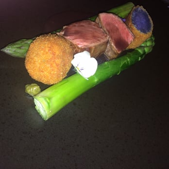 Seasons Restaurant & Bar - Scottish lamb with lamb & mint bonbon, asparagus, purple potato croquette, edible flowers & a red wine jus - Bars Near Me - Edinburgh, EDH